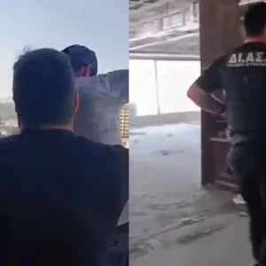 Πειραιάς: Αστυνομικοί την τελευταία στιγμή αποτρέπουν άνδρα να βουτήξει στο κενό από τον 6ο όροφο κτιρίου! (βίντεο)