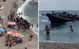 Ισπανία: Η στιγμή που βάρκα με δεκάδες παράνομους μετανάστες φτάνει σε τουριστική παραλία – Σε πανικό οι λουόμενοι
