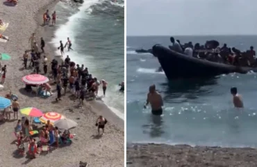 Ισπανία: Η στιγμή που βάρκα με δεκάδες παράνομους μετανάστες φτάνει σε τουριστική παραλία – Σε πανικό οι λουόμενοι